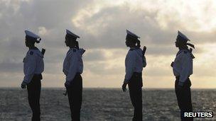 Vietnamese naval soldiers patrolling Truong Sa Dong island in the Spratly archipelago