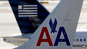 American Airlines and US Airways tail fins