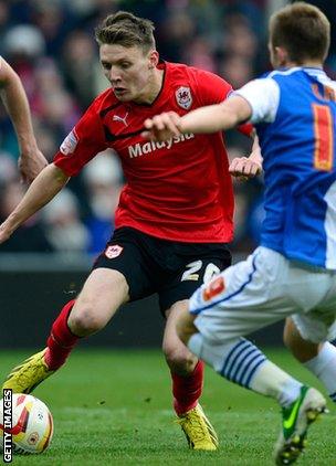 Forward Joe Mason weaves through the Blackburn defence to fire in the second Cardiff goal