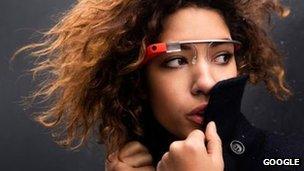 A woman models Google Glass