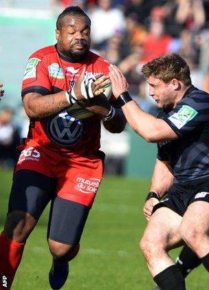 Toulon centre Mathieu Bastareaud takes on Leicester's Tom Youngs