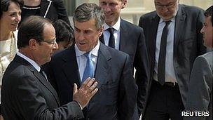 President Francois Hollande (left) talking to ex-budget minister Jerome Cahuzac, 3 Apr 13