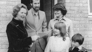 Margaret Thatcher hands over the deeds to the council house belonging to the King family of Milton Keynes, Buckinghamshire, 25th September 1979.