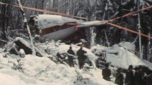 People examining the wreckage of the plane at Basle on 10 April 1973