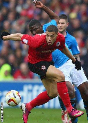 Cardiff substitute Rudy Gestede is challenged by Forest’s Guy Moussi