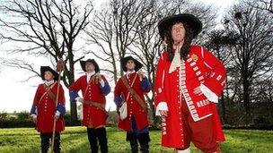 The documentary contains footage of dramatic re-enactment of the siege of Derry