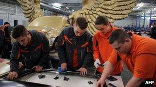 Group of apprentices at work