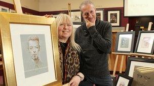 Terry and Peter Howson with some of his work which is being sold