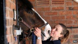 Police horse handler, Isabelle Collins, with Bud