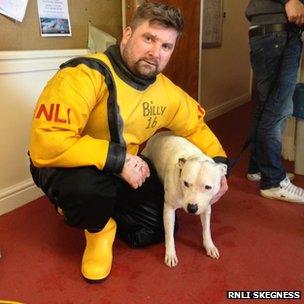 Storm the dog with crew member Billy Harrison