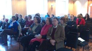 Audience watching screening in Flora Anderson hall