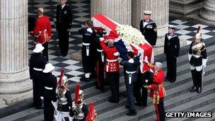 Members of the Armed Services carry the coffin up the steps during the Ceremonial funeral of former British Prime Minister Baroness Thatcher at St Paul's Cathedral