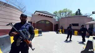 Police outside Mr Musharraf's house on the outskirts of Islamabad