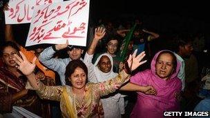 Demonstrators show their backing for Mr Musharraf but support for the former leader is far from universal