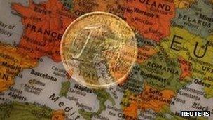 Euro superimposed on map