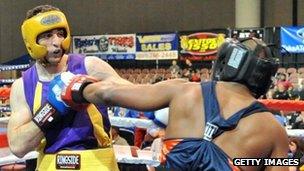 Tamerlan Tsamaev, left, takes part in a boxing match in 2009