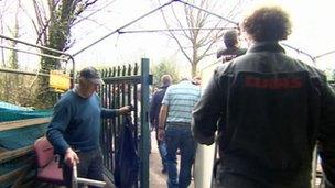 Protesters leaving the site