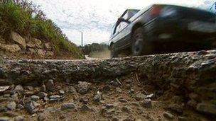 Pothole in road