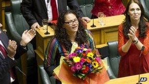 New Zealand lawmaker Louisa Wall, centre, who sponsored the gay marriage bill is congratulated by Labour leader Davis Shearer, left, and MP Jacinda Ardern after the Marriage Amendment Bill was passed at Parliament in Wellington, New Zealand Wednesday, 17 April 2013