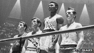 The 1960 Olympic medals for light heavyweight boxing on the winners' podium at Rome