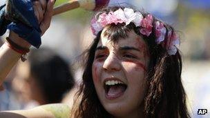 A young woman taking part in a march celebrating the 1974 revolution, on April 25 in Lisbon