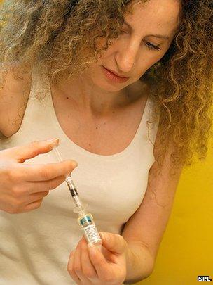 A woman taking a drug treatment for multiple sclerosis