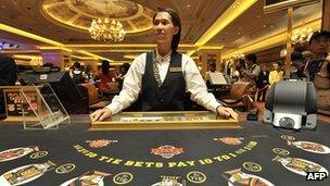 A dealer at a gambling table in Macau