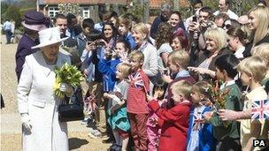 The Queen greeted by crowds at Headley Court military rehabilitation centre