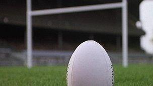 Rugby ball and posts