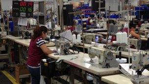 Woman working on a factory floor