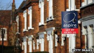 A home with a "To Let" board outside