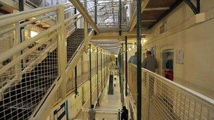 Prisoners in a cell block at Wormwood Scrubs, a Category B prison in London.