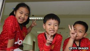 Young Manchester United fans in Shanghai, China, in 2012