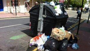 Overflowing rubbish bin in Brighton