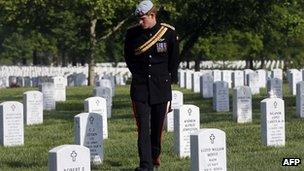 Prince Harry walking through Arlington cemetery