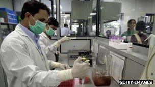 Indian laboratory researchers conduct tests at the Ranbaxy Laboratories in Bombay