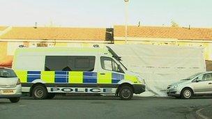 Police at a house in Ellesmere Port