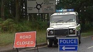 police car at road closure