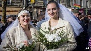 File pic of women posing during a march in favour of gay marriage in Paris, 27 January 2013