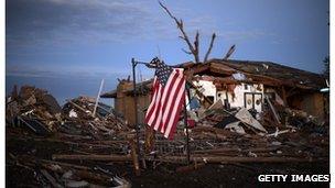 A US flag is seen amongst the debris of a house in Moore, Oklahoma.