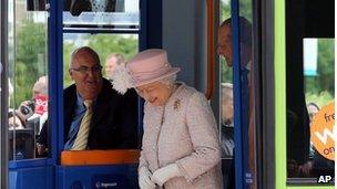 Mick Capper driving the guided bus for the Queen and duke