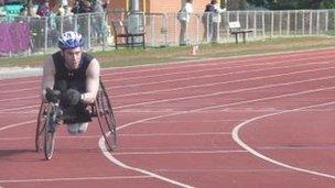 Justin on the track in his racing wheelchair