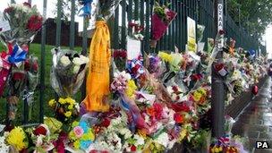 The scene at the junction of Artillery Place and John Wilson Street which has become a shrine to Drummer Lee Rigby