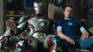 Robert Downey Jr and friend in Iron Man 3