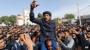 Unemployed men protest in the central Algerian city of Ouargla, March 2013