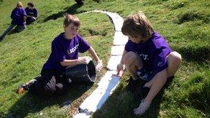 Painting the Long Man of Wilmington