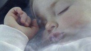 Child surrounded by smoke