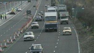 Middle-lane hogging traffic on a busy road