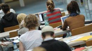 Students working on laptop computers