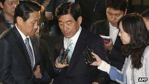 File photo: former National Intelligence Service director Won Sei-hoon, centre, leaves the Supreme Prosecutors' Office in Seoul, South Korea, 30 April 2013